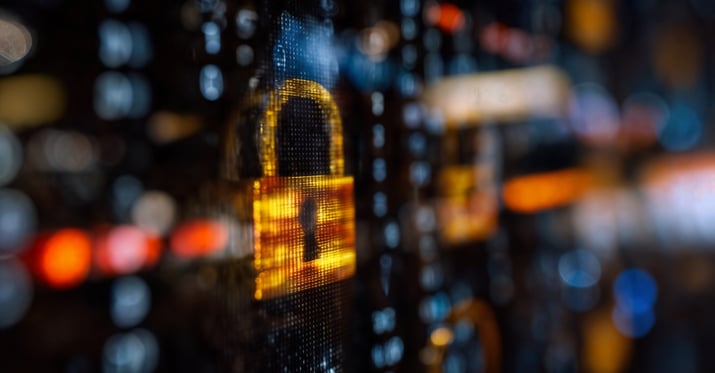 Image graphic of a padlock with key hole on digital laptop screen with a computerized looking backdrop